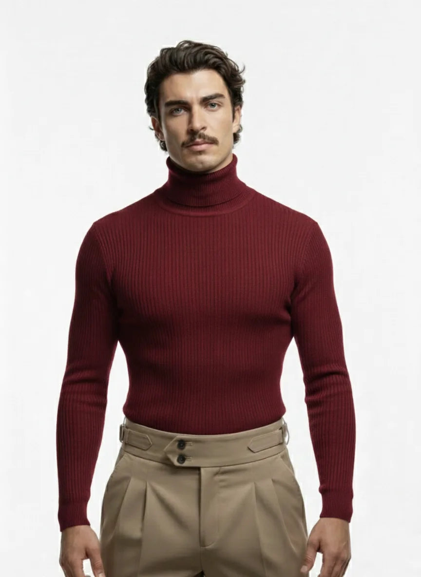 Man wearing a red turtleneck sweater and beige pants on a white background
